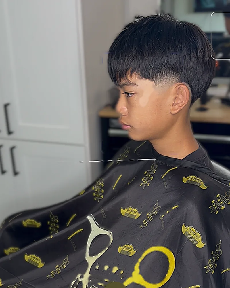 Textured bowl cut with a clean low fade
