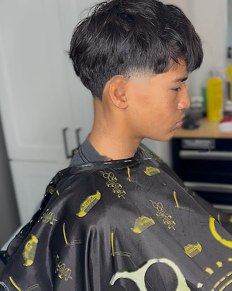 Layered textured cut with a tapered back, three-quarter view