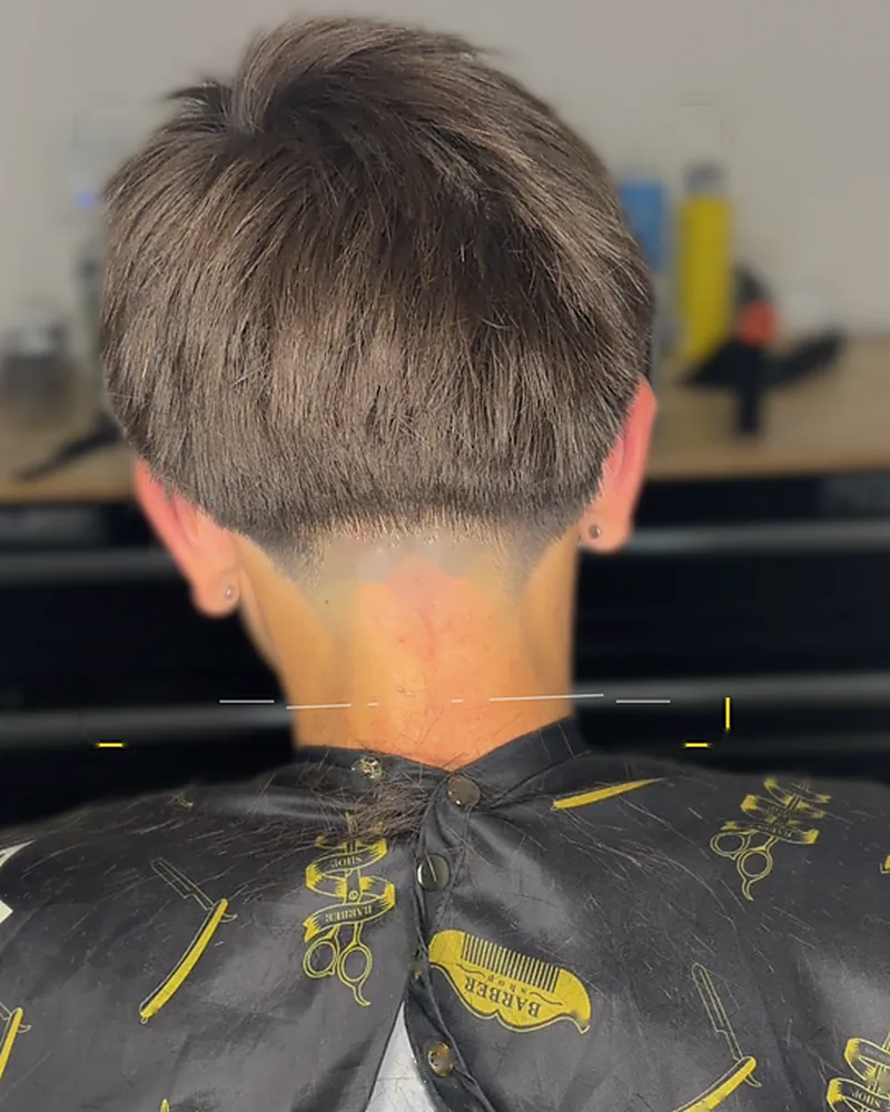 Brushed-up textured top with a tapered nape, back view